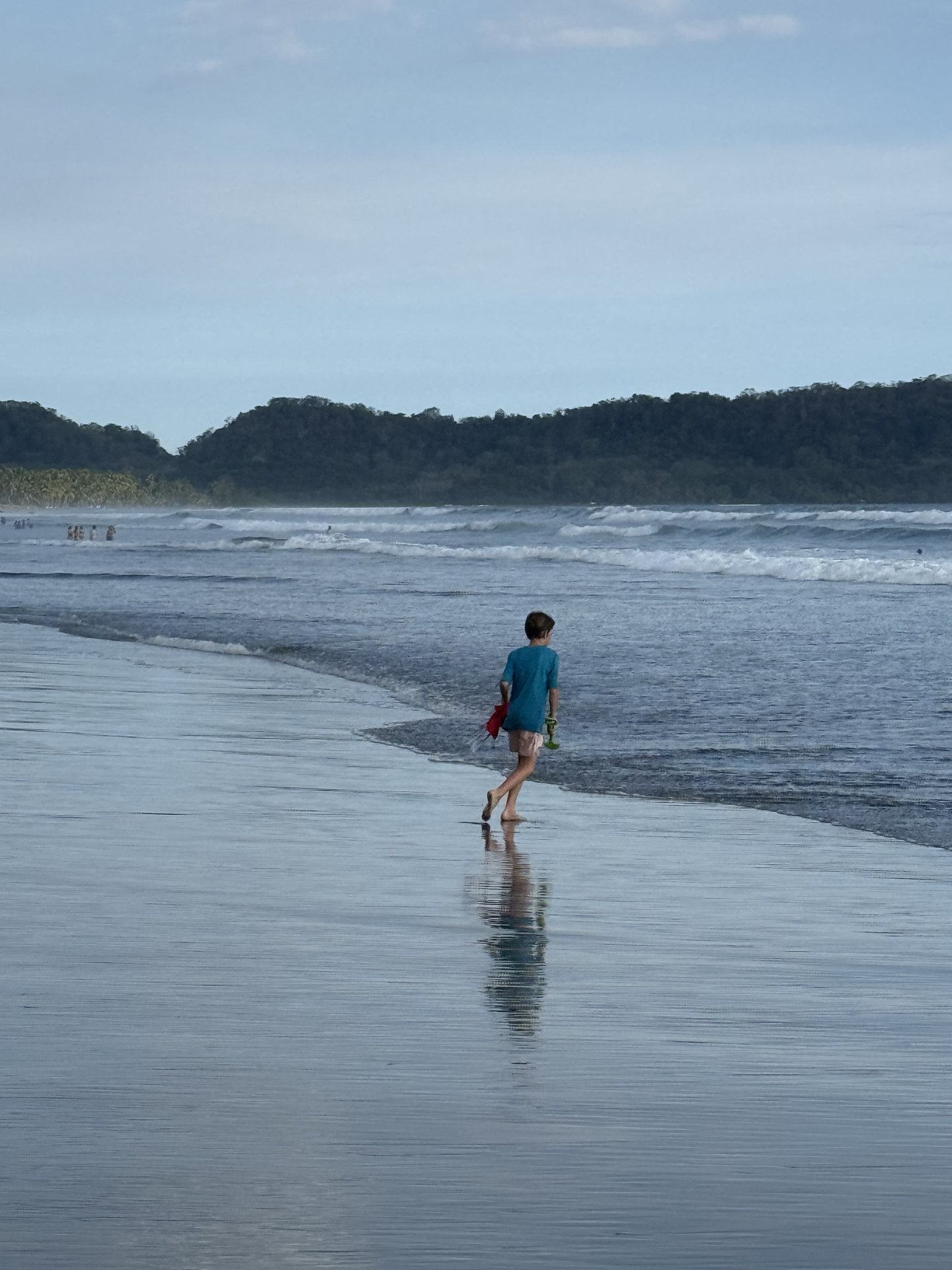 Surfer silhouette at Playa Coyote, Mar del Sol shoreline
