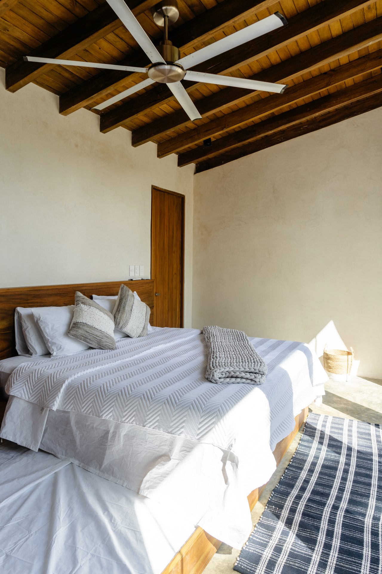 King-and-twin family bedroom with hardwood ceiling, Guanacaste villa