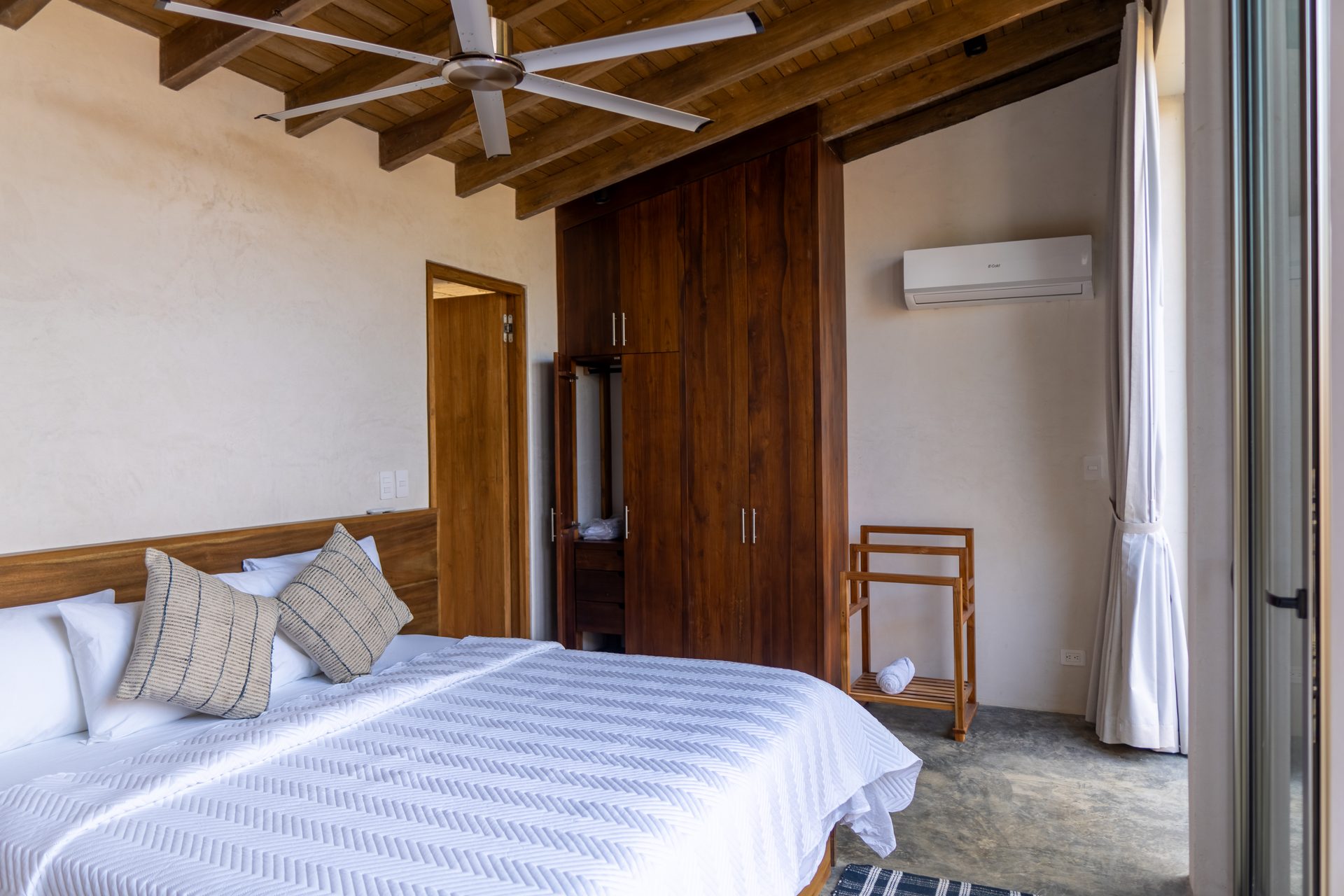 King bedroom opening to private bath garden, Costa Rica beachfront home