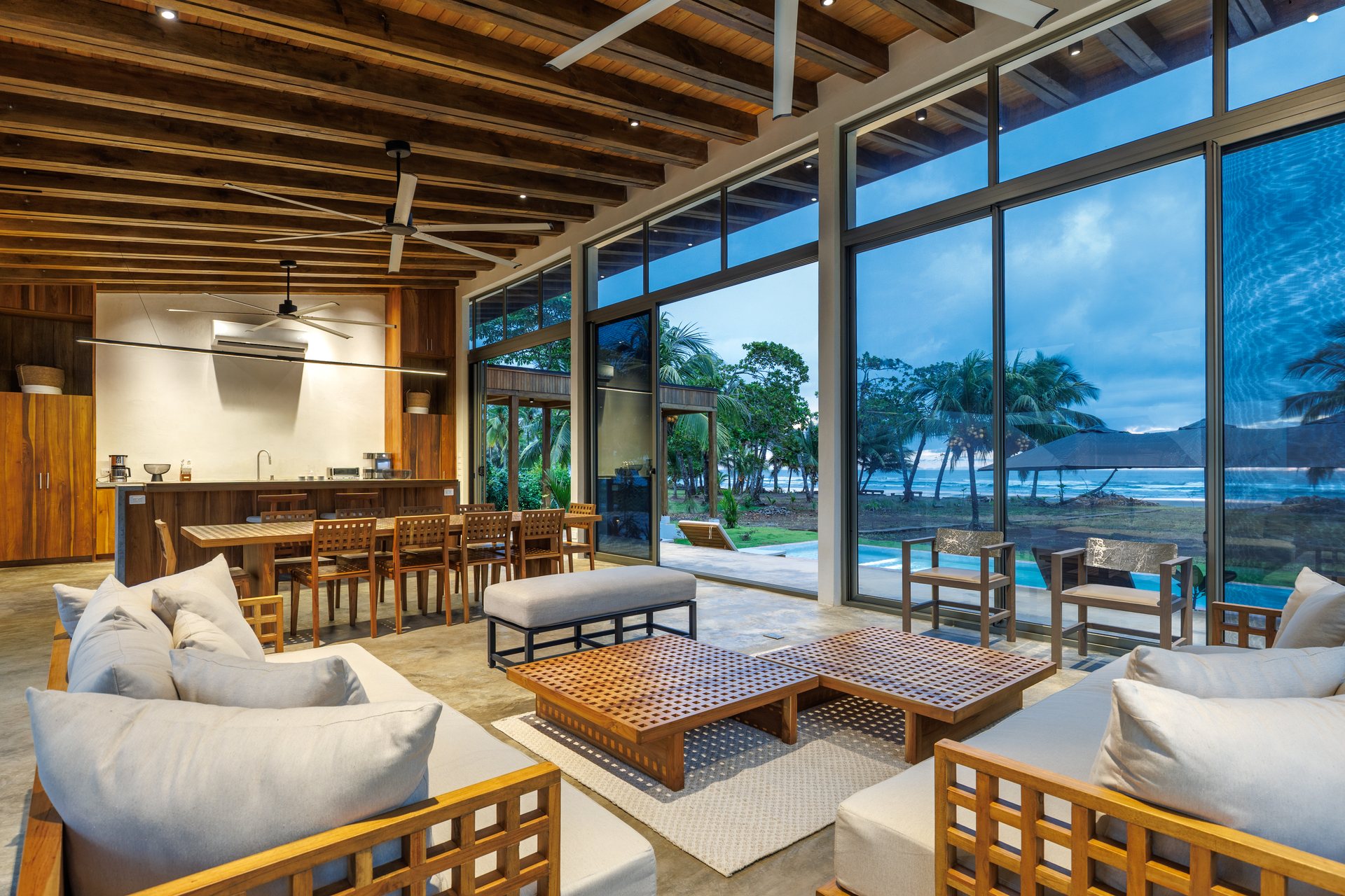 Great room of Mar del Sol opening to the lawn and Pacific, beachfront family villa Playa Coyote Costa Rica