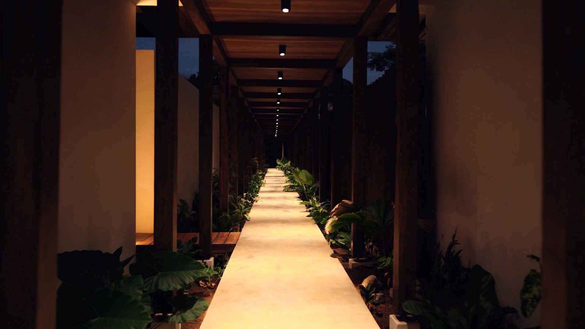 Great room at twilight with kitchen counter and lounge, Mar del Sol Costa Rica