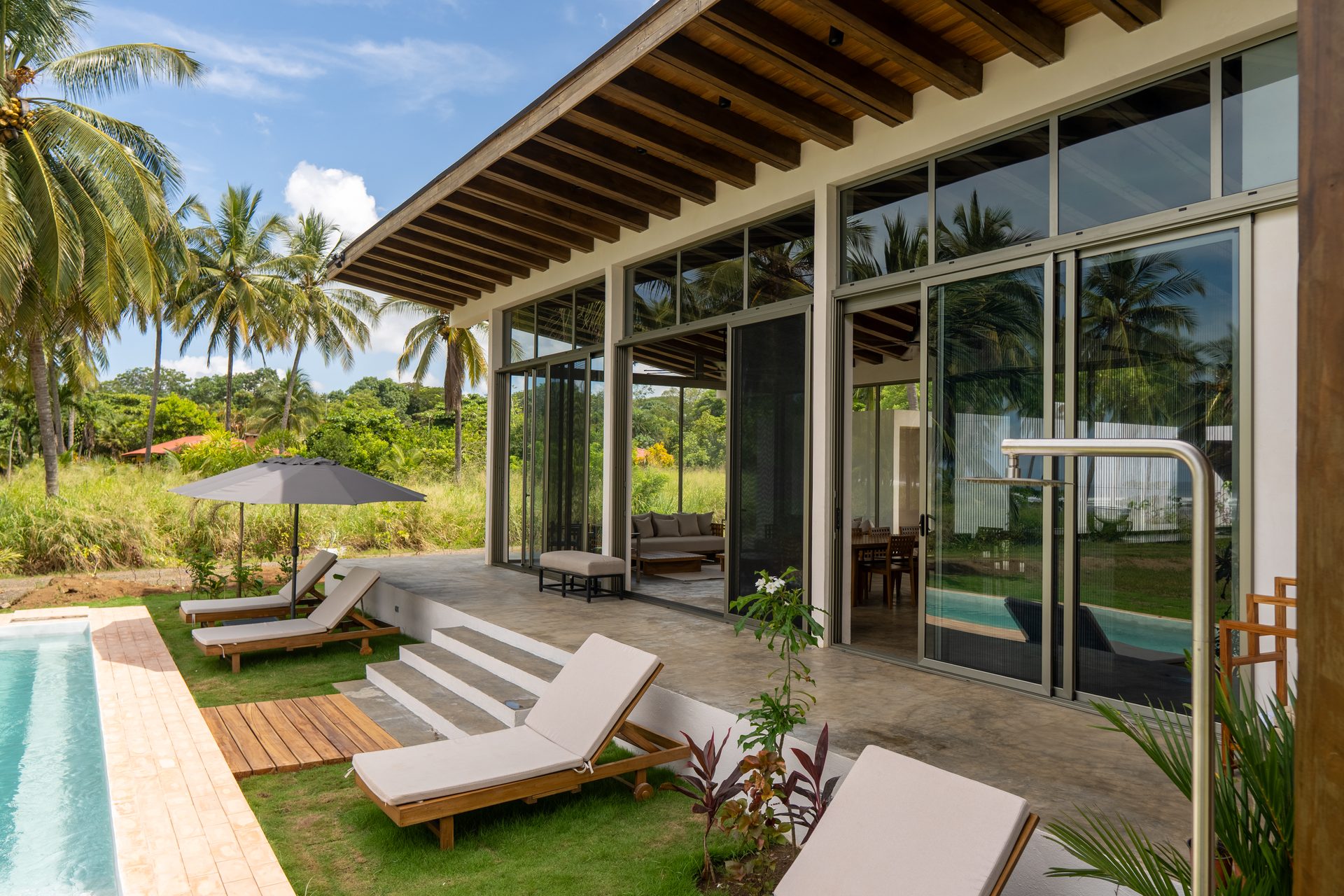 Pool deck looking back to the house, Guanacaste beachfront home