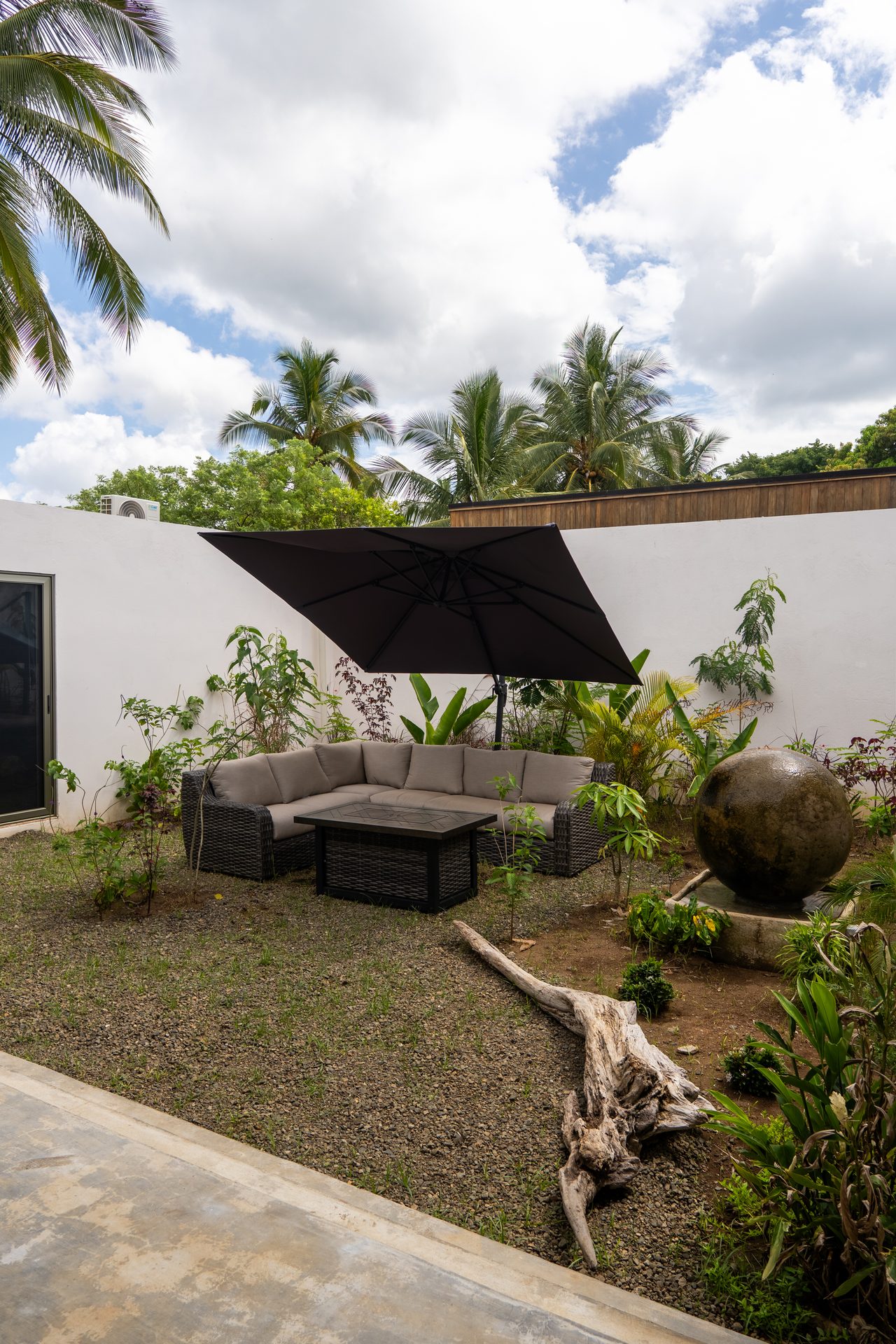 Shaded patio with daybed and lounge, beachfront villa Costa Rica
